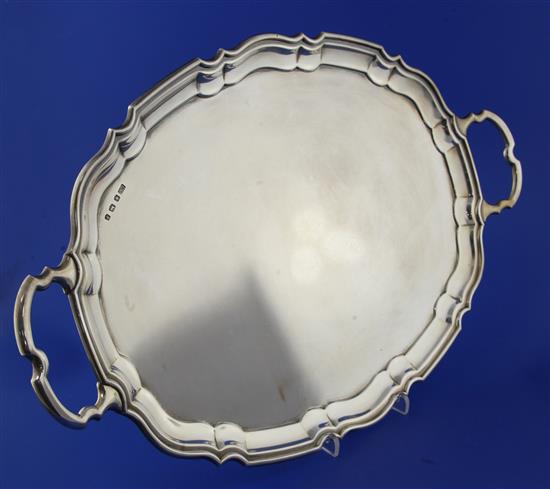 A 1930s silver two handled tea tray, 55 oz.